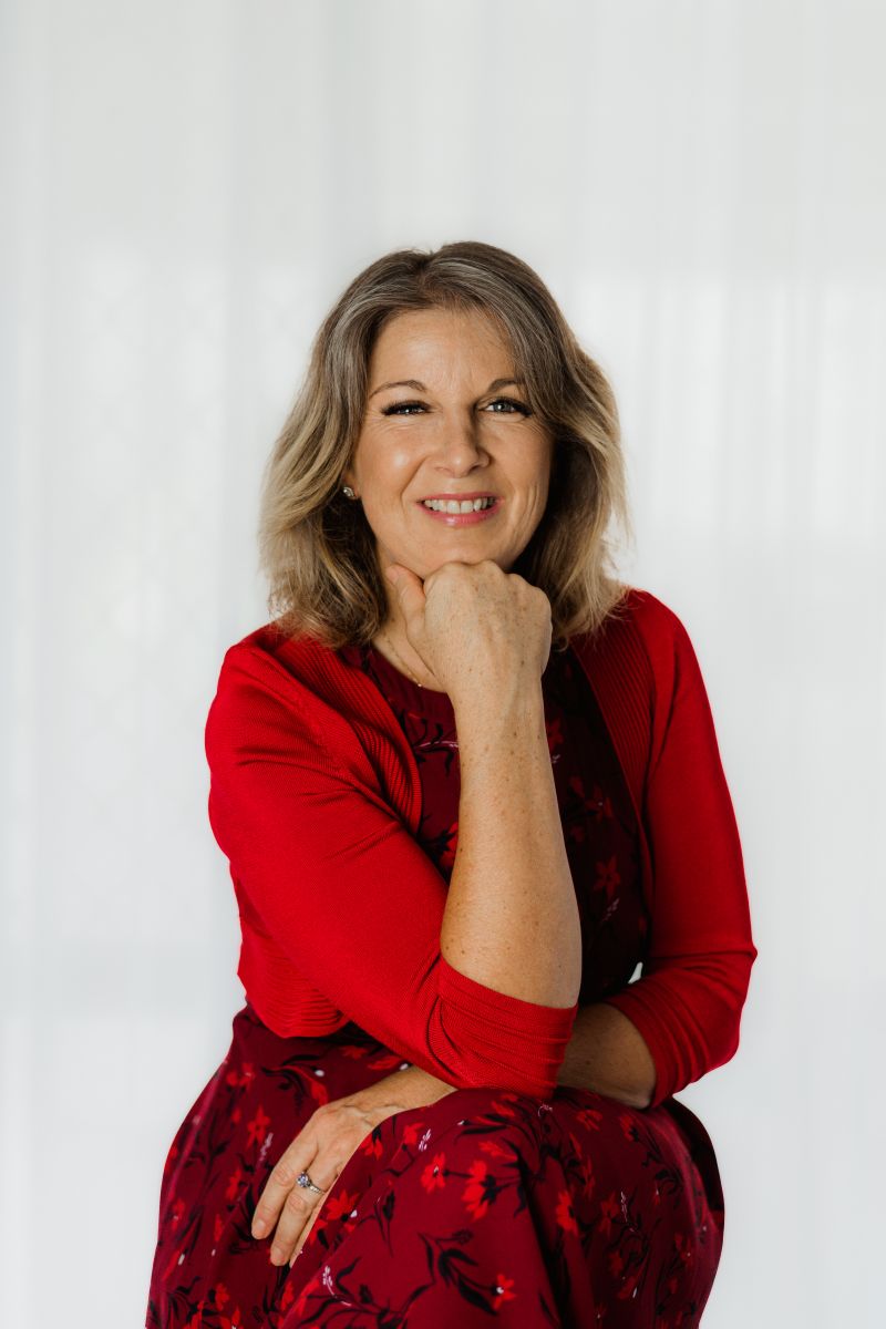 Image of Jacqx Melilli in red dress