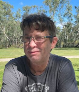 Image of a Gum Tree with an overlay of S. Thomas Montgomery in the background